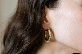 Bold gold stud earrings are the hottest trend of summer 2023